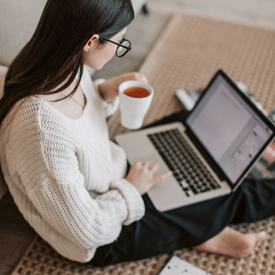 Busy professional reviewing a digital calendar on a tablet